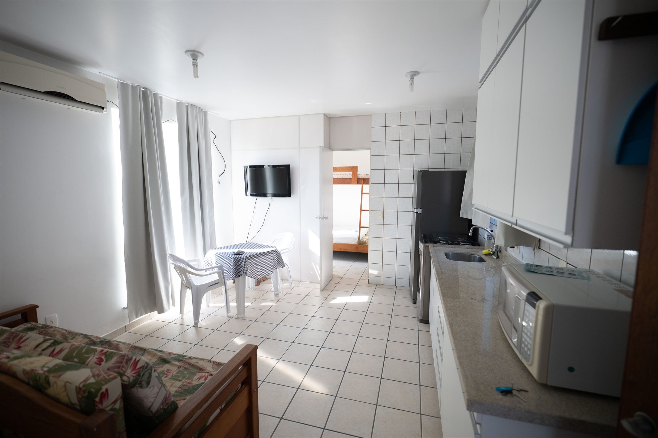 Sala e cozinha do Apto Studio do Tarot Residence